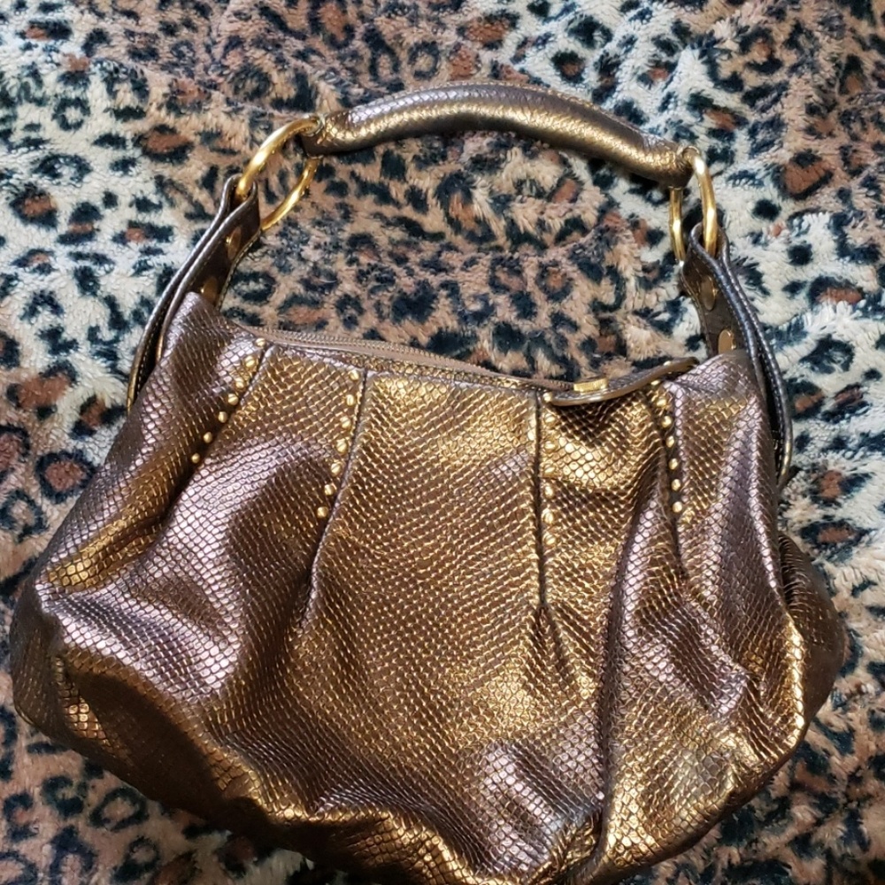 Gold hand bag